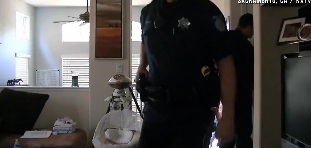Police take away baby