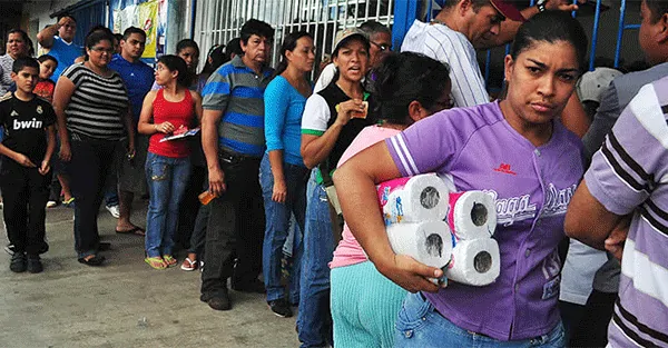 Venezuelan woman earns her entire living standing in line to buy toilet paper